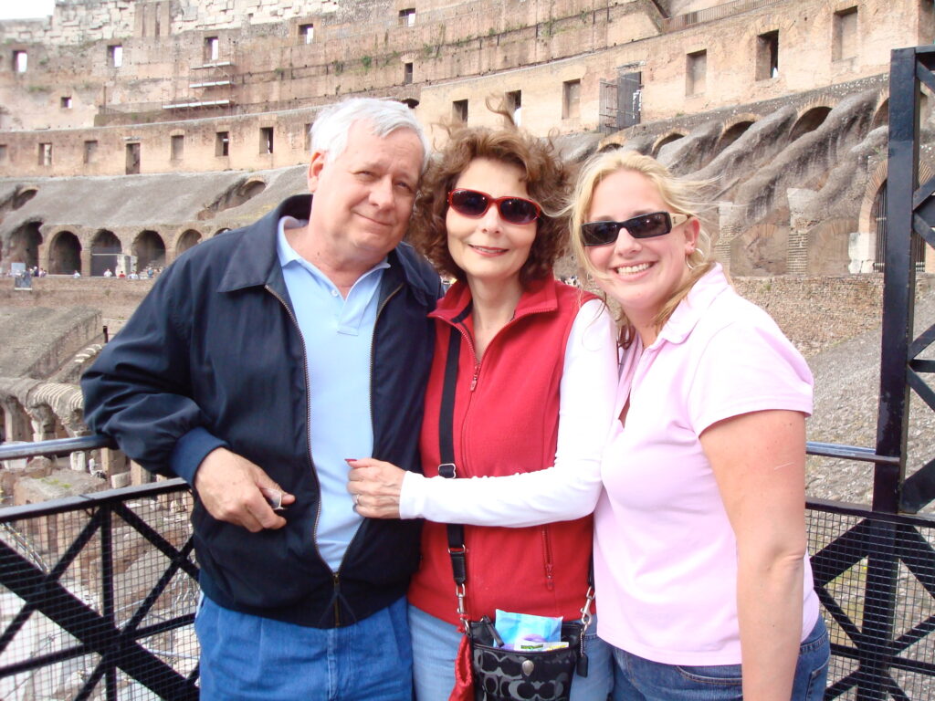 Laura and her parents at the Roman Colosseum