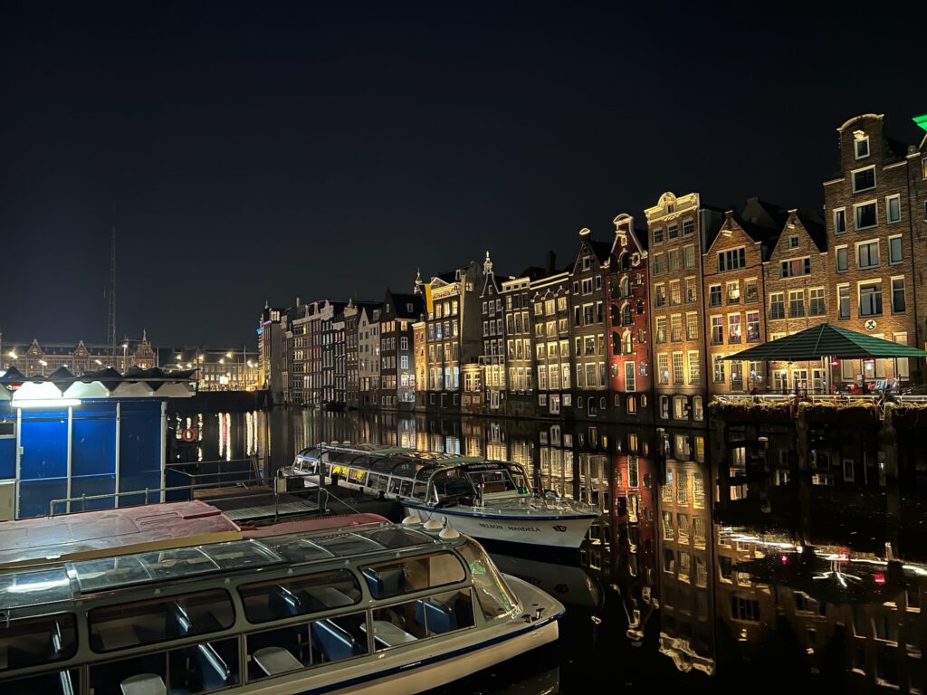 Canal houses light at night