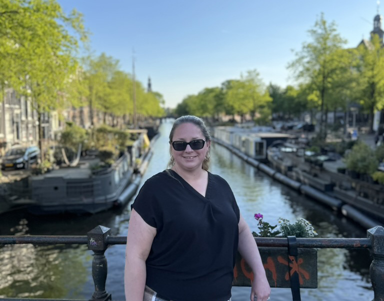 Laura on a bridge on the Herengratch Canal in the Jordaan neighborhood Amsterdam.