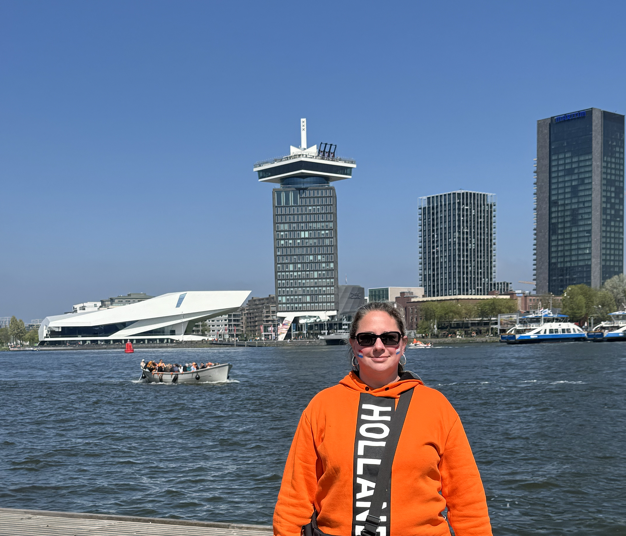 Laura in Front of the A'damTower on King's Day
